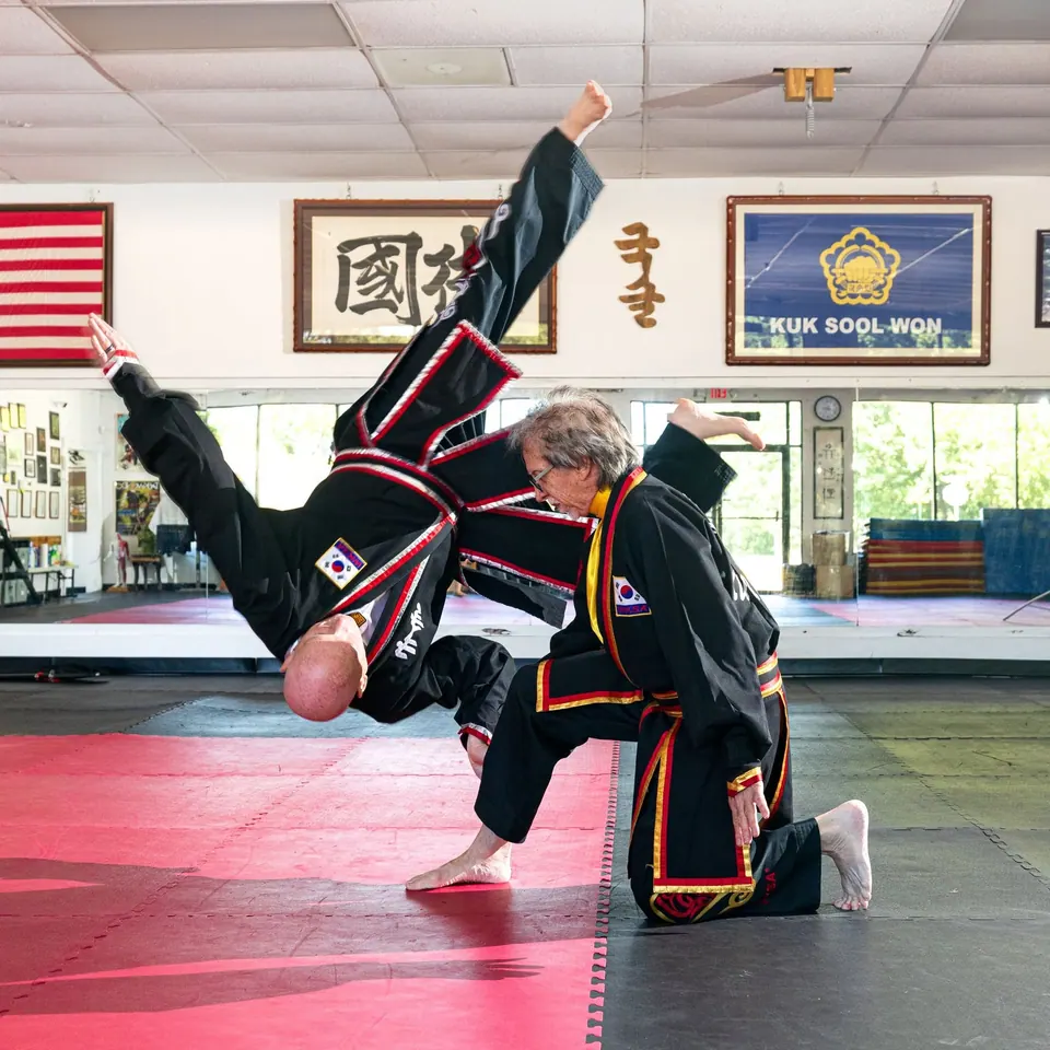 KSW STL instructors demonstrating a traditional martial arts technique